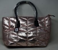 A Kurt Geiger Carvela Bronze Lush nylon quilt shopper bag.