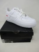 A pair of as new Nike x Supreme Air Force 1 Low SP in White/White (UK 10, Box Damaged).
