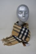 An as new Burberry sequined check cashmere scarf (Article 8050535 - RRP £484).