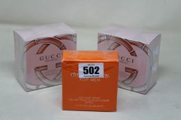 Two Gucci Bamboo eau de parfum (75ml) and one Clinique Happy cologne spray for men (50ml), all boxed