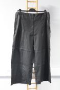Two pairs of as new Lurdes Bergada Wide coated trousers (L - RRP £93 each).