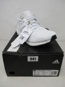 A pair of white Adidas Ultra Boost 4.0 DNA running trainers (Size UK 10).