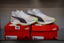 Two pairs of men's boxed as new Puma Deviate Nitro Spectra Running Shoes in white (UK 9, 12).