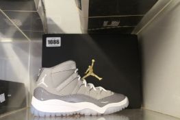 A pair of children's as new Nike Jordan 11 Retro (UK 13K).