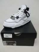A pair of boxed as new Nike Air Jordan 4 Retro GS ‘DIY’ in black/white (5Y).