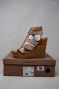 A pair of as new Carvela Kunnning Wedge in Tan (Size 39).