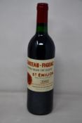 A bottle of 1989 Chateau-Figerac Premier Grand Cru St Emilion (Over 18s only).