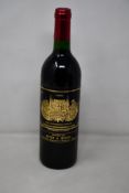 A bottle of 1990 Chateau Palmer Margeaux Medoc (Over 18s only).