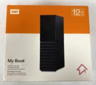 A boxed as new WD My Book 12TB Desktop Storage Drive (Box sealed) (EAN: 718037872148).