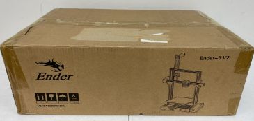 A boxed as new Creality Ender 3 V2 3D Printer (Box sealed, some cosmetic damage to box).