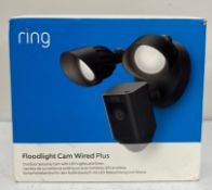 A boxed as new Ring Floodlight Cam Wired Plus in Black (Box opened) (EAN: 840080595283).