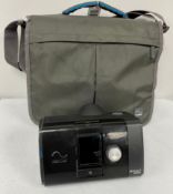 A pre-owned ResMed AirSense 10 Autoset CPAP Machine with UK power supply and padded carry bag (Untes