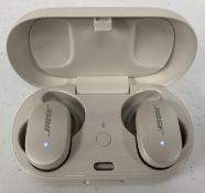 A pre-owned pair of Bose QuietComfort Earbuds with Charging Case in Soapstone.