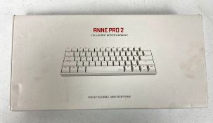 A boxed as new Anne Pro 2 Gateron Brown Switch 60% Mechanical Keyboard in Black (US keyboard layout.