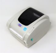 An as new TSC TDP-247 Direct Thermal Desktop Label Printer (PSU included. No Box).