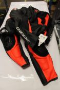 An as new Dainese Assen 2 motorcycle all in one leather suit black/flou-red (Size 58).