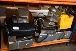 Three pre-owned countertop fryers to include Buffalo, a pre-owned Panini press, a Casio cash