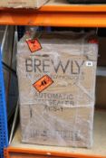 A boxed as new Brewly Automatic Can Sealer ACS-1.