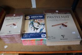 Twenty two Clairefontaine Pastelmats (15 x 18 x 24cm and 7 x 30 x 40cm) along with four Faber-