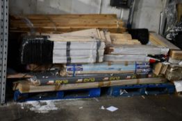 A quantity of miscellaneous timbers to include flooring, garden timber and other related items.