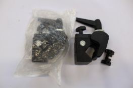A quantity of as new Manfrotto 035 Super Clamps (Approximately 40).