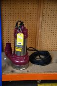 An unbranded Submersible Pump (NOTE: Plug is damaged and may need replacing, viewing is advised).