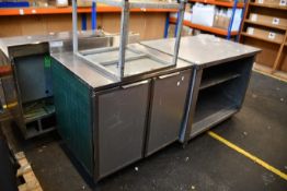 A pre-owned Victor countertop preparation unit, a pre-owned Duke SUBP-36m preparation table and