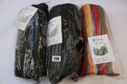 Three Potenza Hammocks: Two Santia XL in black and one Singa XL multicolour.