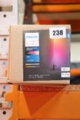 A boxed as new Philips Hue Gradient Signe Floor Lamp in Black (EAN: 8718696176283).