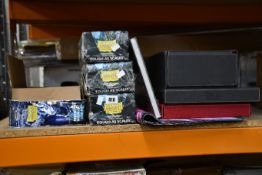 A quantity of Dragon shield products to include card sleeves, playmats and other related items.