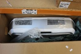 A pre-owned AeraMax Professional IV air purifier.