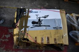 A Wahoo Kickr Smart Bike Trainer (Has some damage, viewing is advised).