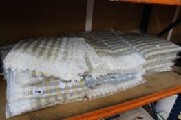 A large quantity of as new Roliku tablecloths (Approximately 35, various sizes).