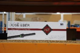 A boxed as new Jose' Eber HST 25mm Clipless Curling Iron (Some minor damage to packaging).