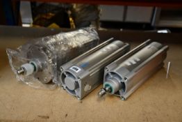 Two Festo Pneumatic Piston Rod Cylinders - 1384811 (DSBC-100-200-PPVA-N3) and one Festo ISO Cylinder
