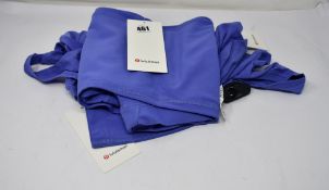 One pair of LuLuLemon Groove Pant SHR Chai flares (Size 6) and two Love Tank Chai activewear vest