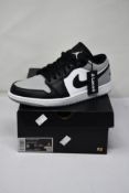 A pair of as new Nike Air Jordan 1 low trainers (UK 8).