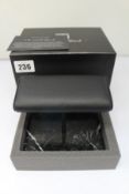 An as new The Watch Stand Duo Black and Silver Watch Stand.