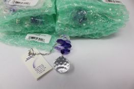 Twelve as new Woodstock Chimes Crystal Sunrise Cascade Sun-Catchers in Purple (EAN: 028375270118).