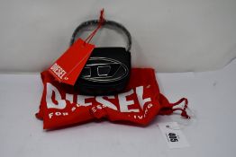 A woman's as new 1DR XS Leather Mini Bag in black.