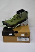 A pair of as new Salomon Cross Hike Mid GTX (UK 6.5).