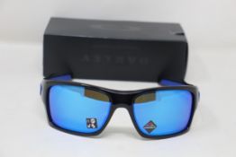 A boxed as new pair of Oakley Turbine Sunglasses in Black Ink with Prizm Sapphire Lens (REF: OO9263,