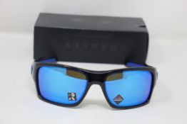 A boxed as new pair of Oakley Turbine Sunglasses in Black Ink with Prizm Sapphire Lens (REF: OO9263,