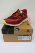 A pair of boxed as new Salomon Ultra Glide Trail Running Shoes in Biking Red/Lunar Rock/Evening
