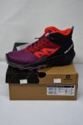 A pair of as new Salomon OUTpulse Mid GTX (UK 6.5).