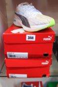 Two pairs of men's boxed as new Puma Deviate Nitro Spectra Running Shoes in white (UK 9, 12).