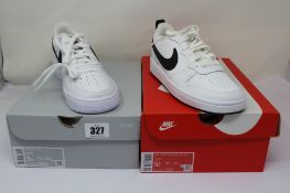 A pair of Nike Air Force 1 in black and white (GS) (UK 4.5/5Y) and a pair of Nike Court Borough