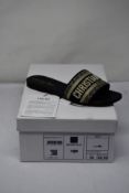 A pair of boxed as new Dior Dway Slide in Deep Blue Embroidered Cotton (Size 36 IT/EU/Size UK 4).