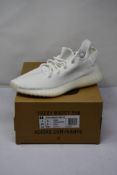 A pair of Adidas yeezy boost 350 (UK 5.5).