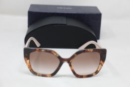 A boxed as new pair of Prada Gradient Butterfly Sunglasses in Caramel Tortoise (REF: PR 24XS, EAN: